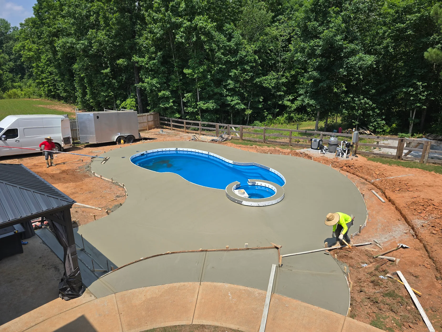 Outdoor pool and patio installation